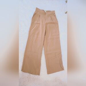 Brand new brown, wide leg, dress pants in US 8. 6 can wear it (not stretchy).